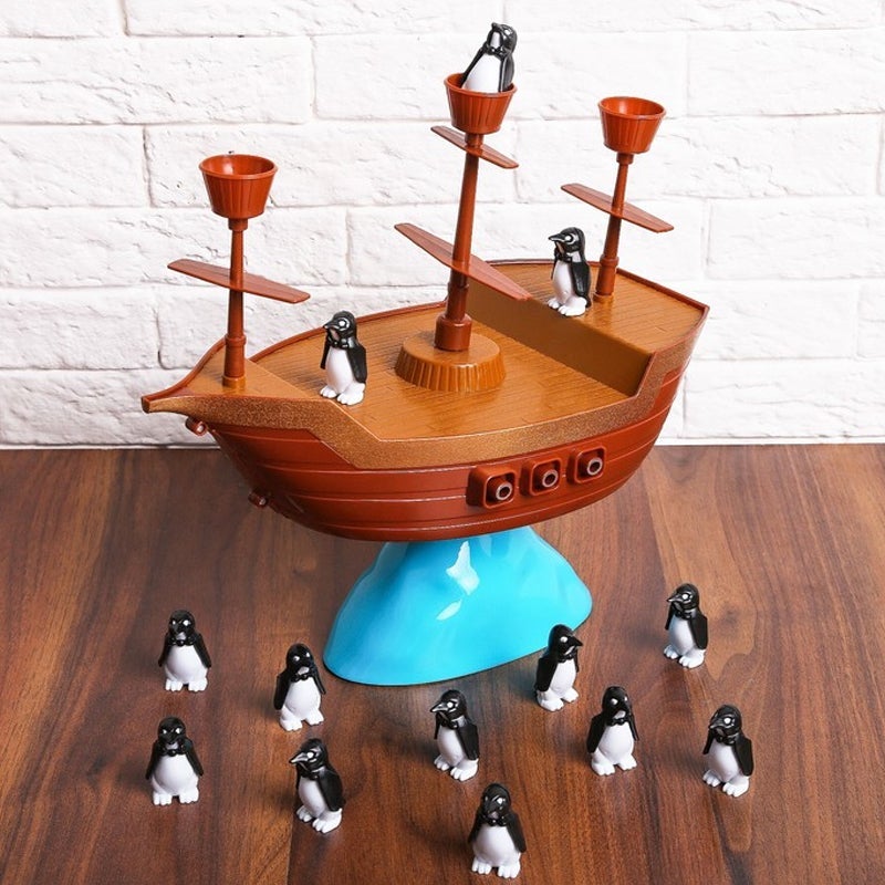 Pinguine Piratenboot Balance-Spiel